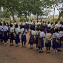 Picture of children in a circle.